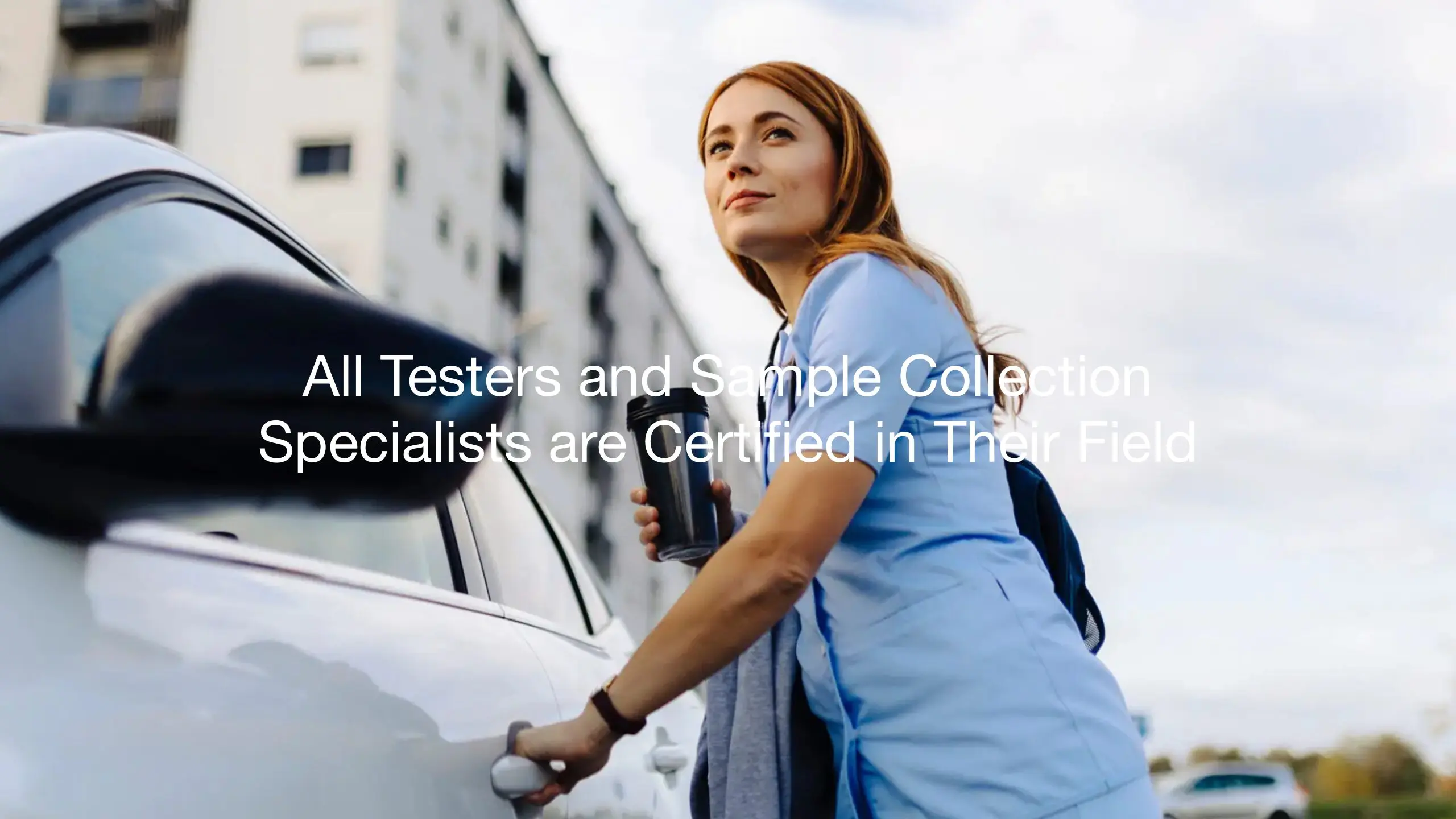 Woman in scrubs opening car door.